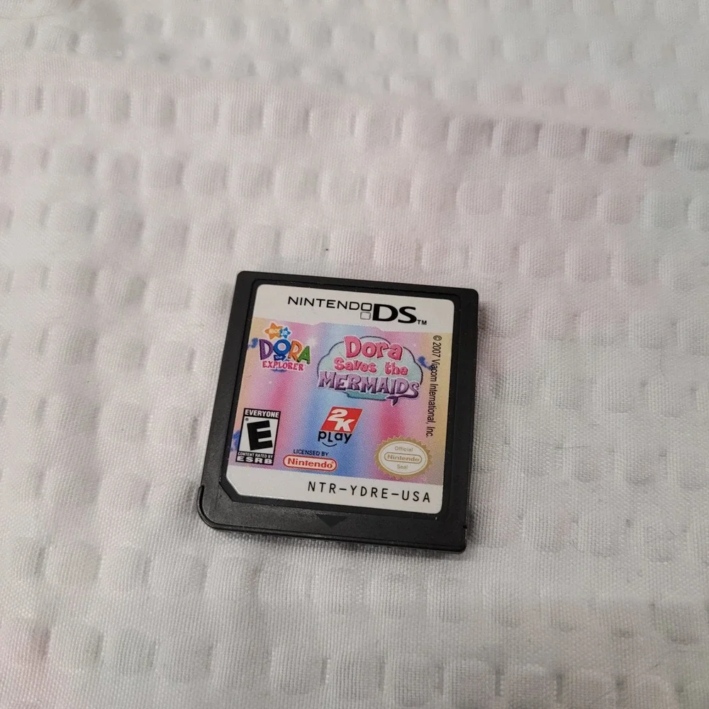 Nintendo DS Game Lot of 7 Garfield Dora Tinker‎ Bell Hello Kitty Pet Vet Santa